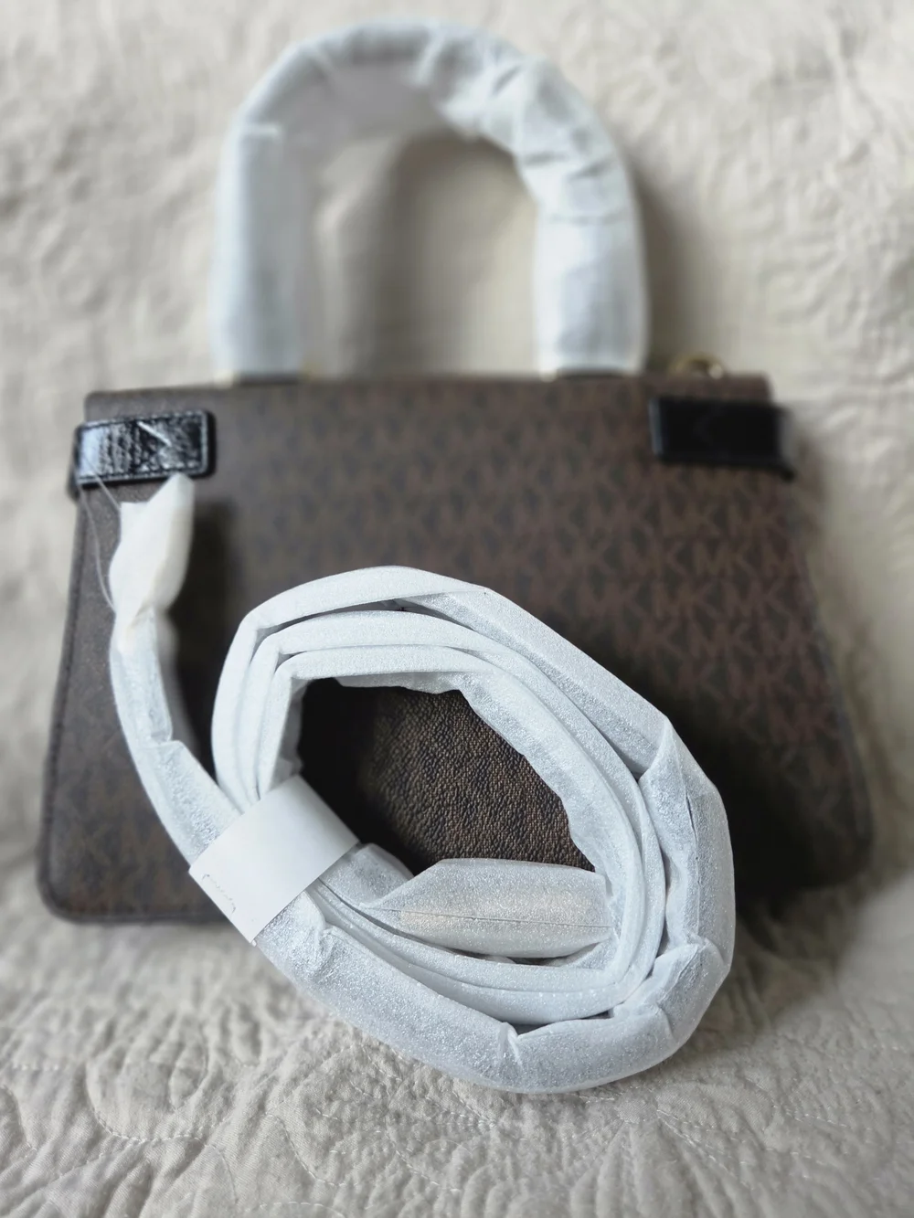 Michael Kors handle signature